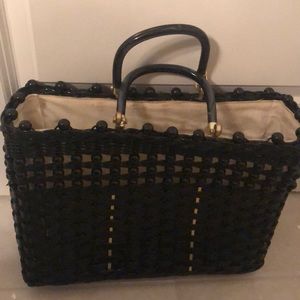 Vintage woven plastic purse. With gold accents.